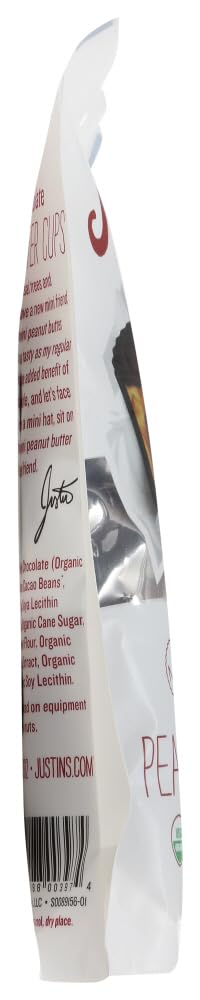 Justin's mini peanut butter cups close-up shows chocolate coating and creamy center.