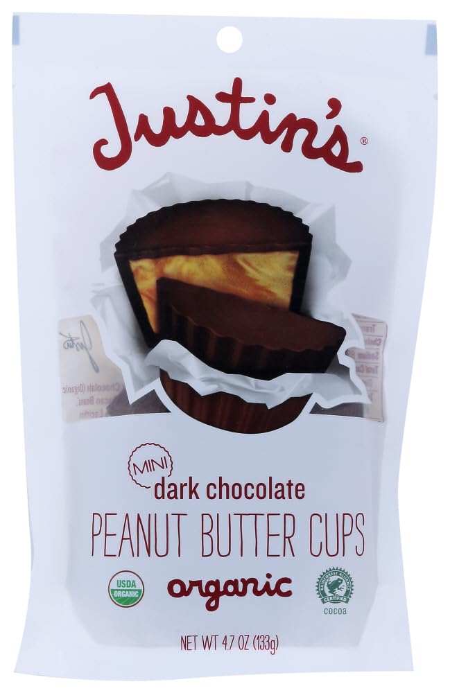 Justin's Organic Mini Peanut Butter Cups in wrapper, premium small-batch snack.