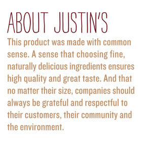 Spoonful of Justin's peanut butter showing smooth, protein-rich goodness