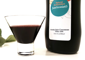 65 BRIX label on JustNature Aronia concentrate.