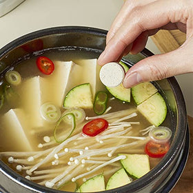 Jwellfood compact coin-stock packaging – portable, mess-free stock solution.