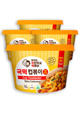K FOOD KOREAN FOOD Cup Tteokbokki appearance shows chewy rice cakes with creamy sauce for a quick treat.