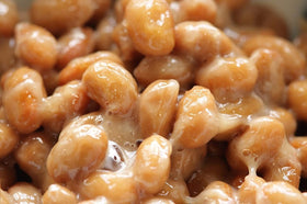 K-Herb Natto powder jar close-up conveys freshness and storage-friendly packaging.