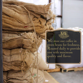 KA`U Coffee Mill Hawai`i Vanilla Macadamia Nut ground coffee beans evoke island sweetness with vanilla-nut aroma.
