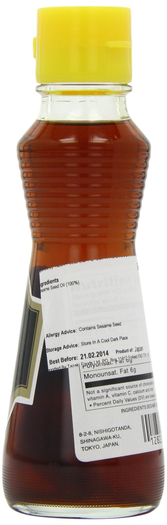 Close-up of Kadoya sesame oil with amber color.