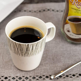 Kaffree Roma teaspoon in hot water for easy preparation