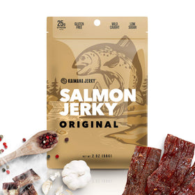 Kaimana Jerky wild-caught salmon jerky original pack on a board, savory and convenient