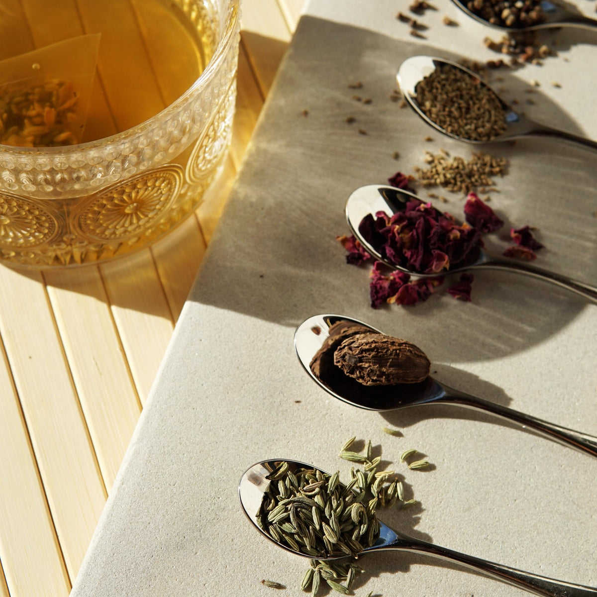 Hot cup of Kappah Fennel Tea showing rich amber infusion.