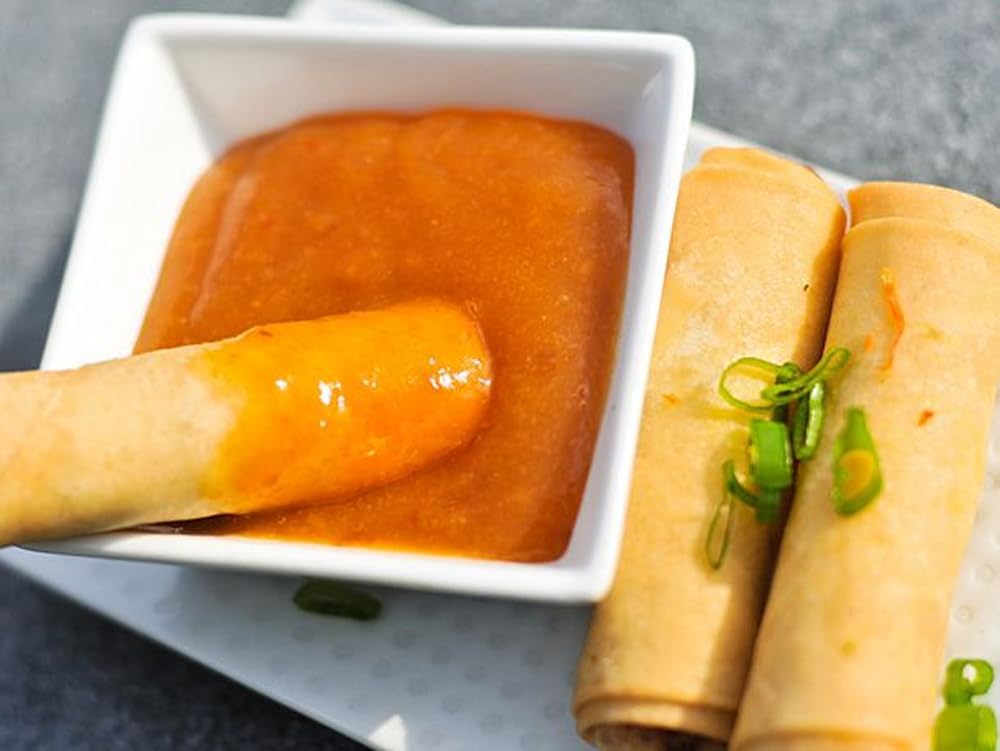 Kari-Out duck sauce dipping with fried items for easy pairing.