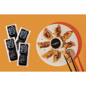 Kari-Out 8g soy sauce packets in case display for bulk catering.