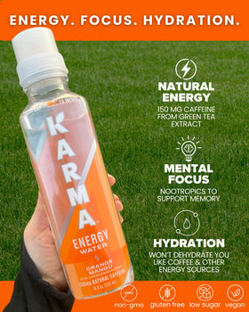 Karma Energy Drink bottle in hand for a quick daytime boost.