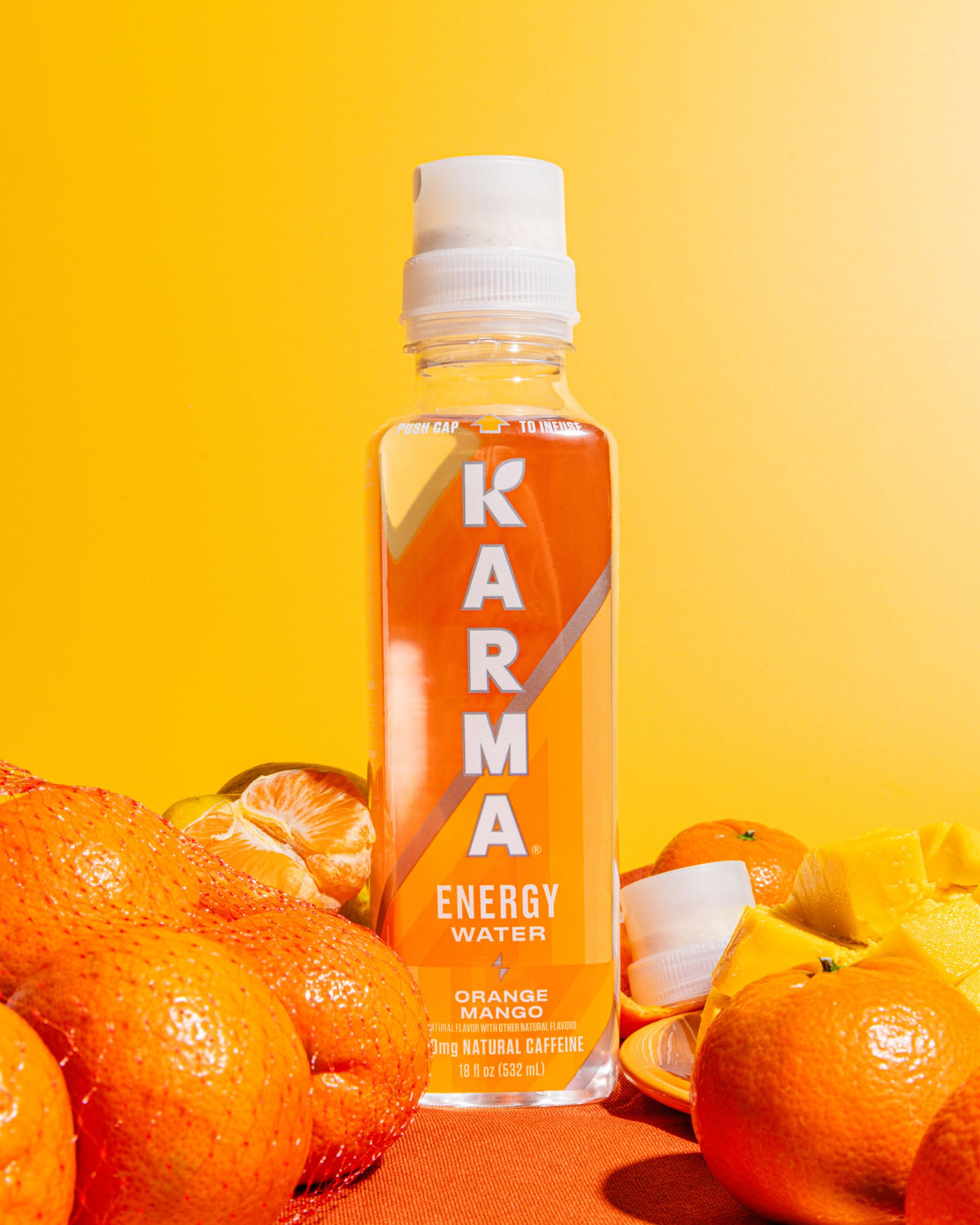 Karma Energy Drink caffeine icon highlights natural green tea caffeine.