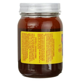 Kary's Original Roux accompanying gumbo bowl, enhancing flavor with authentic Cajun notes.
