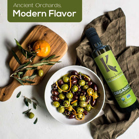 Kasandrinos Organic Olive Oil closeup in a glass bottle highlighting color