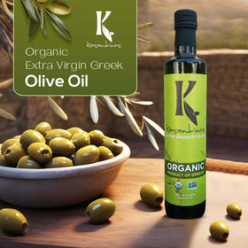 Kasandrinos Organic Olive Oil being poured over a fresh salad to enhance flavor