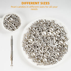 Kasvan 4-claw grabber tool shows precision pickup for edible pearls.