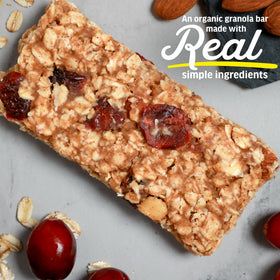 Kate's Real Food cranberry almond bars ingredients closeup showing cranberries and almonds.