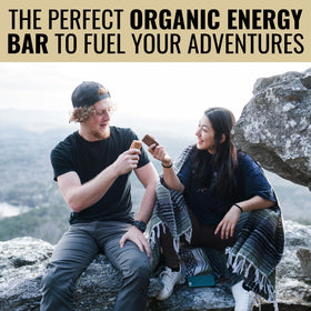 Kate's Real Food granola bar tucked in a backpack for travel-friendly fueling.