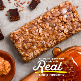 Close-up of Kate’s Real Food granola bar ingredients with organic oats and honey.