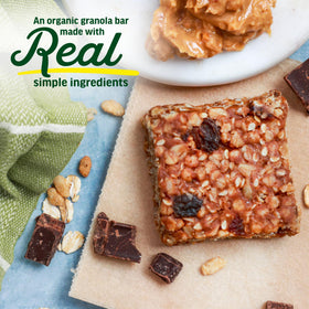 Close-up of Kate’s Real Food mini granola bar texture with oats and dark chocolate.
