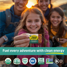 Kate’s Real Food white chocolate macadamia bar ingredients close-up highlights organic oats and honey.