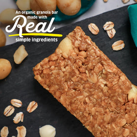 Kate’s Real Food granola bars closeup shows chewy texture and creamy white chocolate.