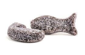 Katja Drop Haringen served on a plate, inviting sharing of Dutch licorice treats