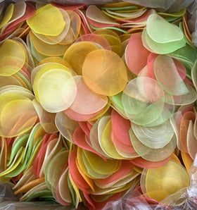 KC Commerce uncooked prawn crackers in a multicolor bowl, ready for frying and festive snacking