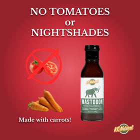KC Natural Mastodon Paleo AIP BBQ Sauce glaze on grilled meat.