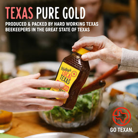 Kelley's Wildflower Honey in a meadow setting reflects Texas beekeeping.