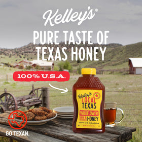 Kelley's Wildflower Honey squeeze bottle dispensing honey precisely for drizzling.