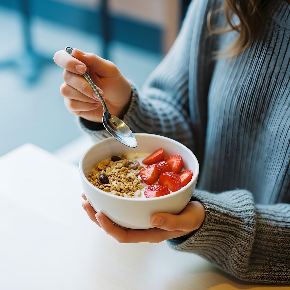 Kelly's Four Plus Granola in reusable-packaging shows eco-friendly packaging