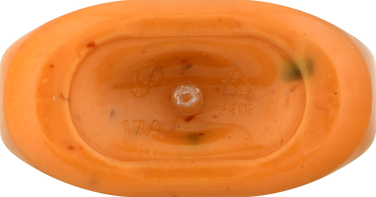 Creamy texture of Ken's Dressing shown on a spoon for tasting