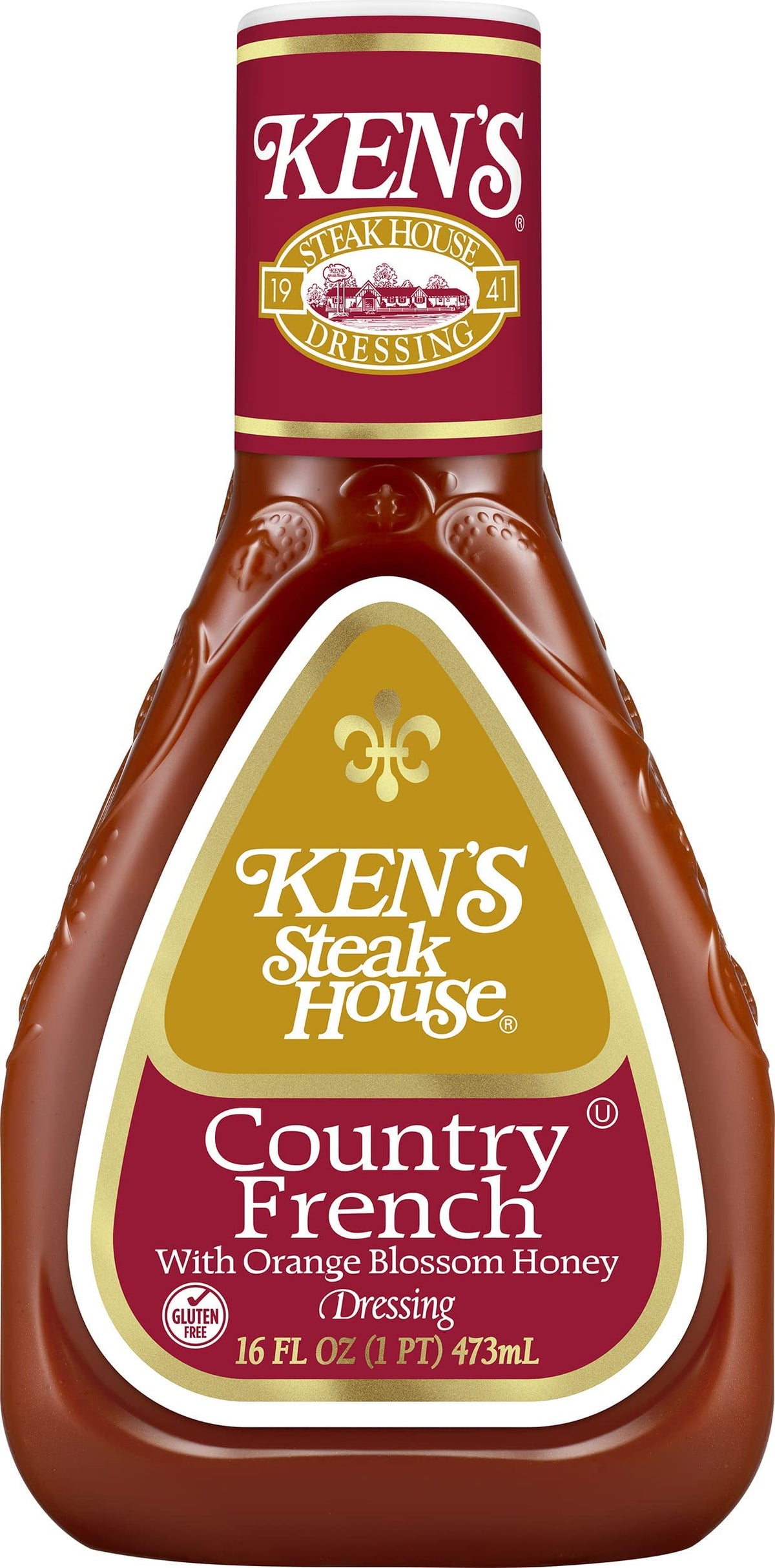 Ken's Country French Honey Dressing bottle beside a plated greens