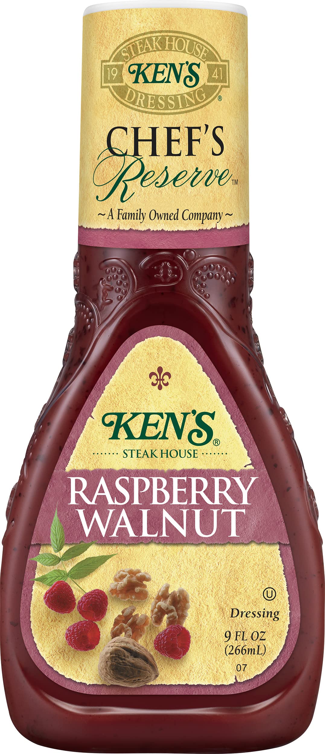 Ken's Raspberry Walnut dressing drizzled on greens for a vibrant fruity finish.
