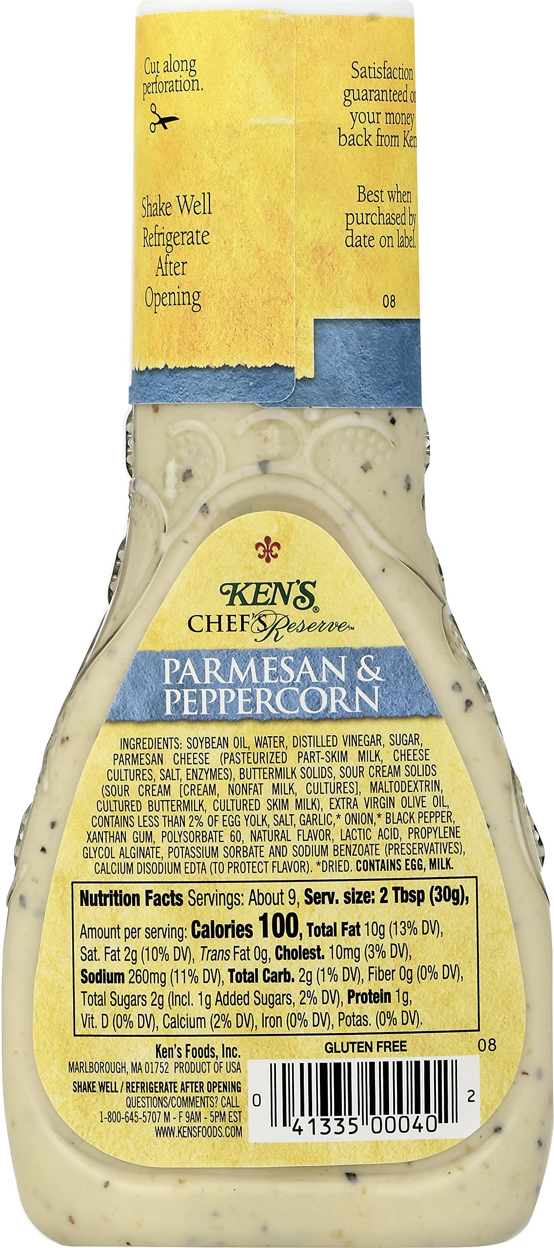 Pouring Ken's Steak House dressing to reveal creamy texture and aroma