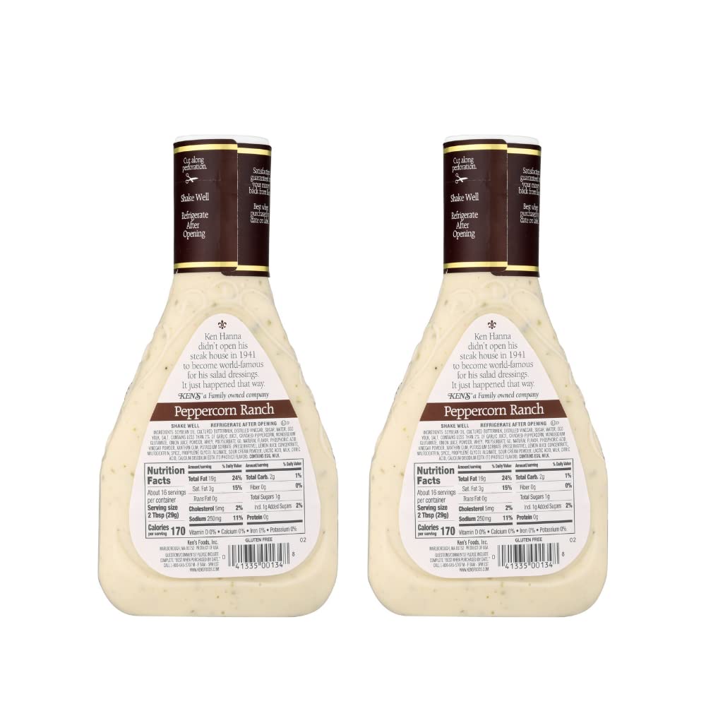 Ken's Peppercorn Ranch dressing being poured over a fresh green salad for tangy creaminess.