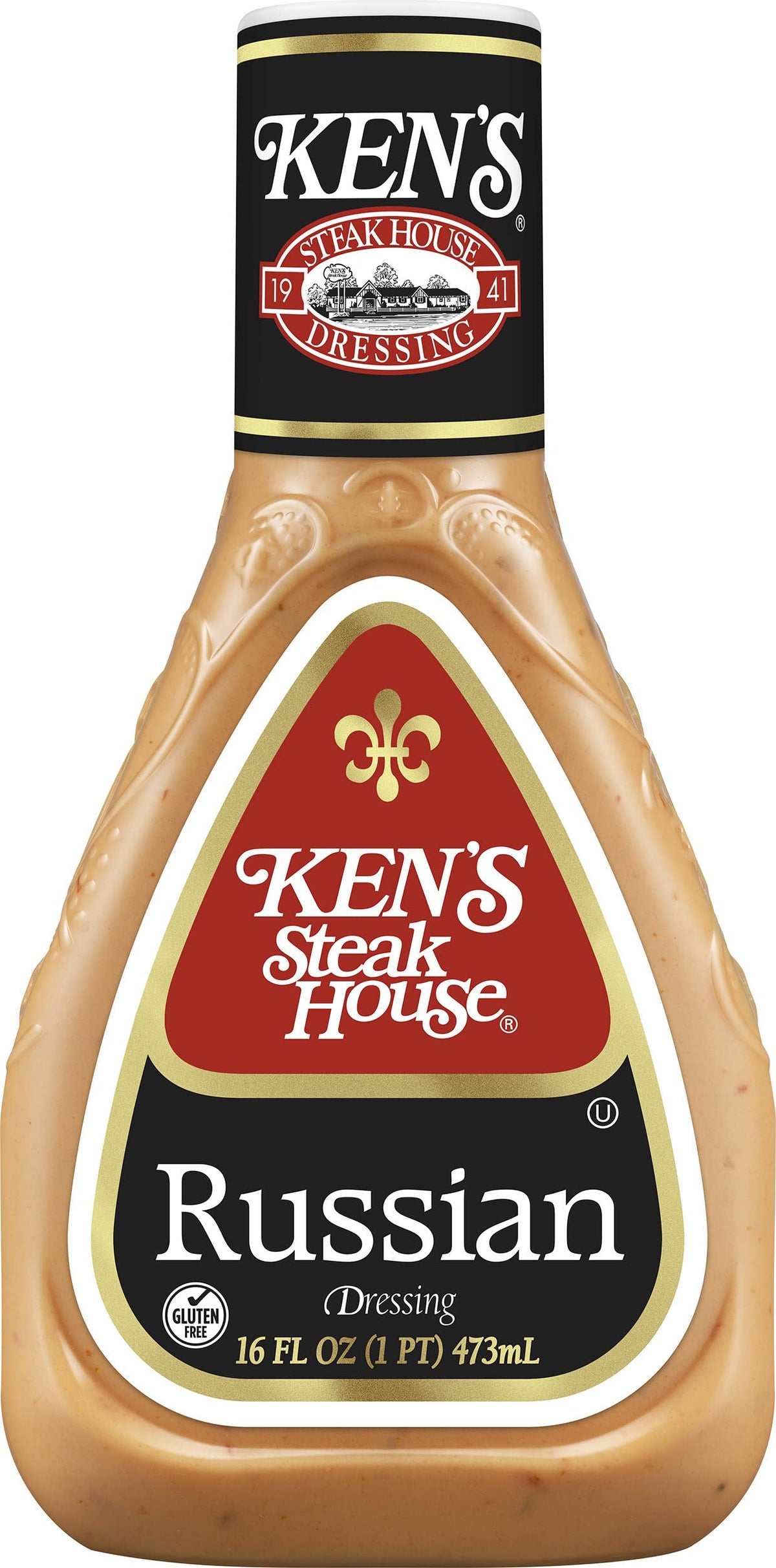 Pouring Ken's Russian Dressing over a burger for zesty flavor.