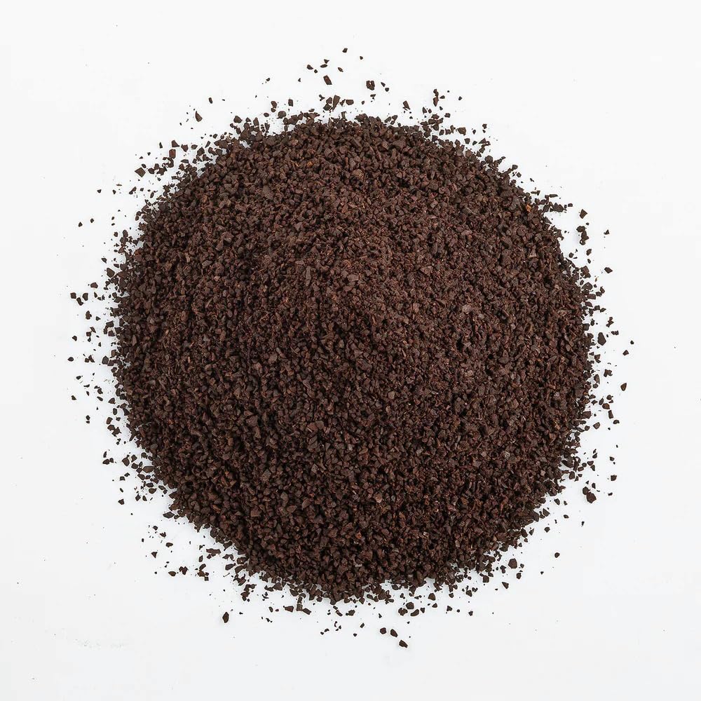 Keokea Coffee ground-coffee-mug setup shows ready-to-brew grounds for mornings.