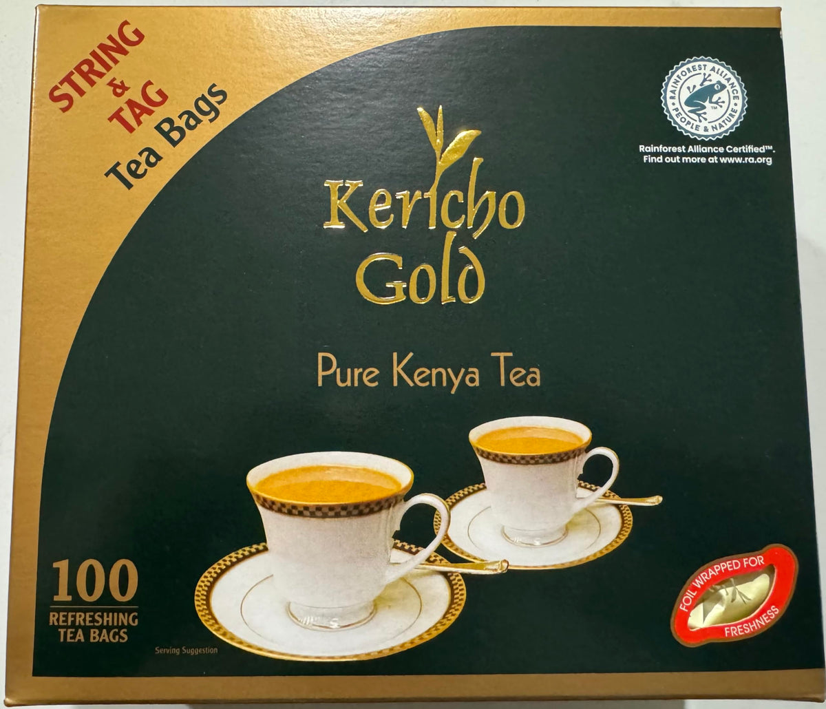 Kericho Gold Pure Kenya Tea in string foil-wrapped packaging, ideal for a rich morning brew.