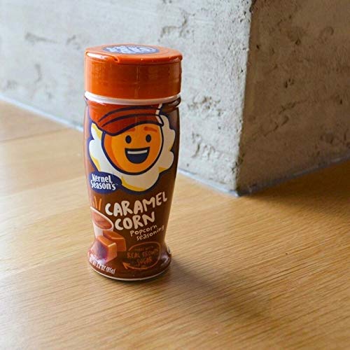 Kernel Seasons caramel popcorn seasoning jar closeup highlighting rich caramel flavor.
