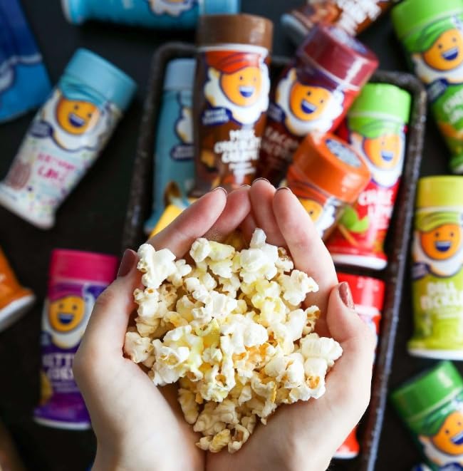 Kernel Season's complete kit bottle pour highlights easy seasoning and flavor variety