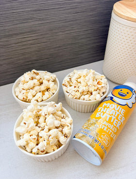 Spritzer image showing a six-pack setup for Kernel Season's butter seasoning.