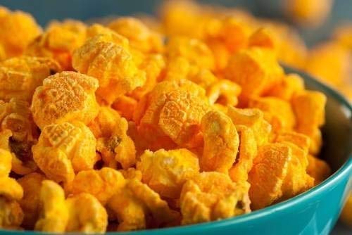 Kernel Season's Nacho Cheddar on popcorn shows rich color and zesty melt.