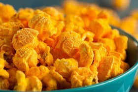 Kernel Season's Nacho Cheddar on popcorn shows rich color and zesty melt.