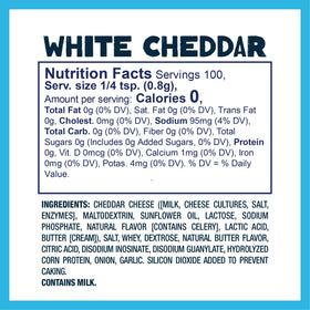 Kernel Season's White Cheddar shaker dusting popcorn with tangy cheese.