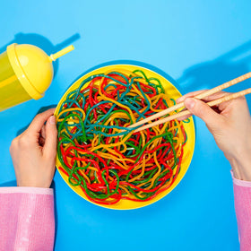 Kervan Bebeto Rainbow Licorice Laces used to tie edible knots.