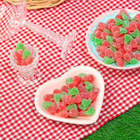 Kervan Bebeto Sour Cherry gummies on party table add colorful treats.