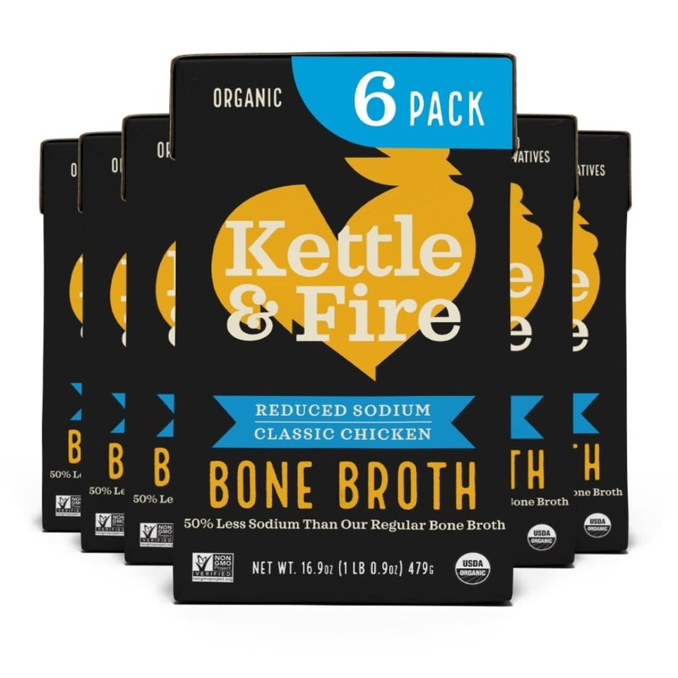 Kettle & Fire Reduce Sodium Chicken Bone Broth 6-pack bottles, convenient protein-rich base for meals.