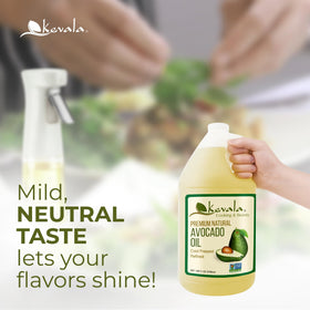 Kevala Avocado Oil drizzled over a fresh salad, providing a light, neutral finish.